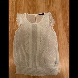 Swiss dot cream tank.